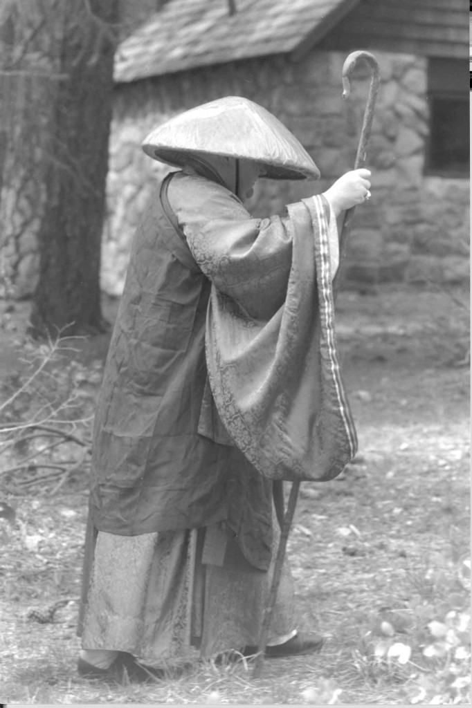 Following where the blood of the Buddha's will lead -- in kesa with monks staff and hat leading a procession during Jukai ceremonies